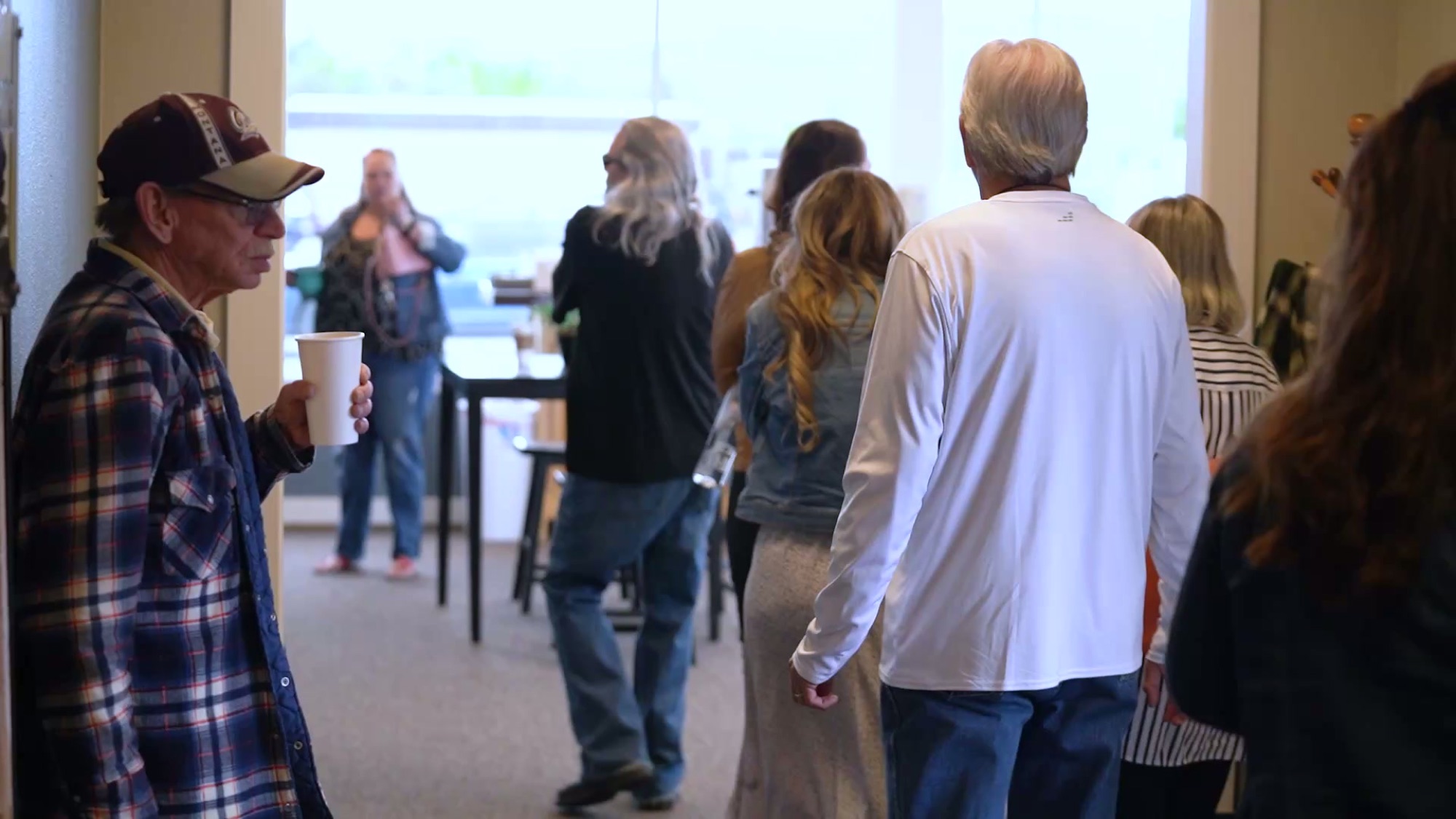 Members of Cornerstone gathering for coffee and conversation before the service